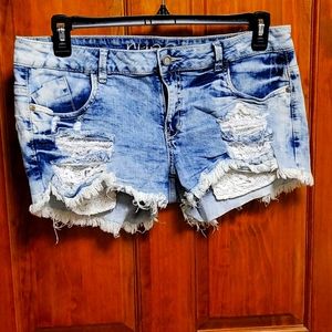 RUE 21 Jean shorts with lace pockets size 15/16.